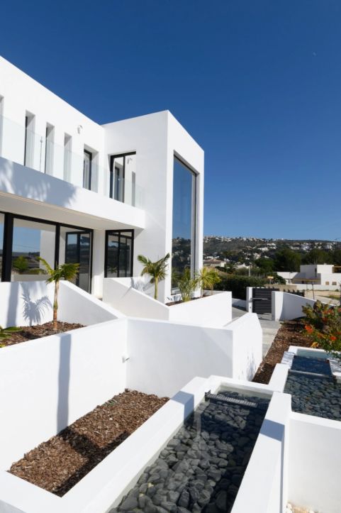 Villa neuve avec vue sur la mer et piscine avec jacuzzi à Moraira
