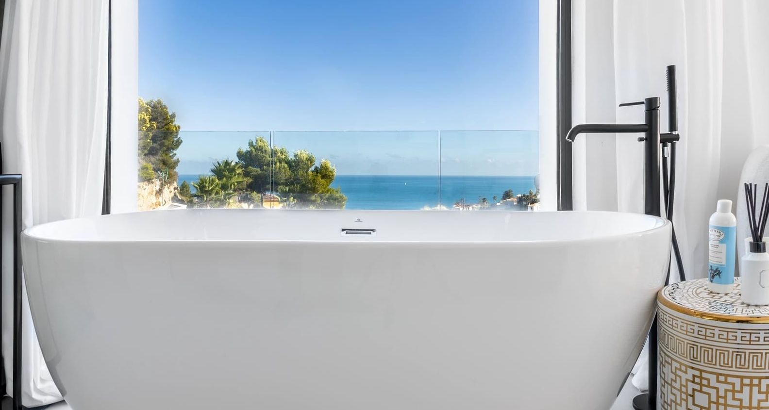 Luxury villa in Portichol, Jávea, with two infinity pools and sea views.