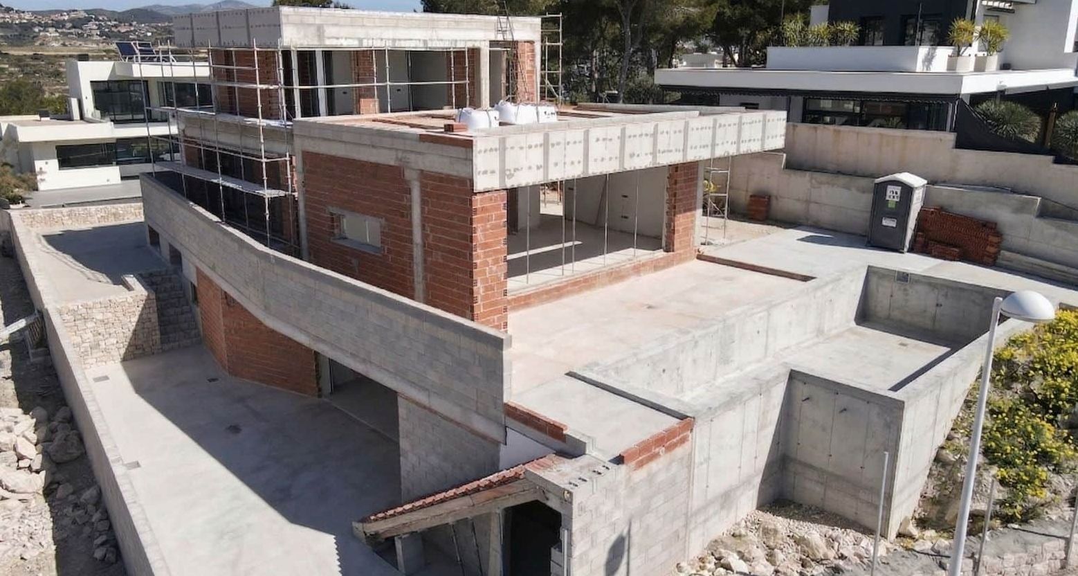Villa neuve avec vue sur la mer et piscine à débordement à Moraira