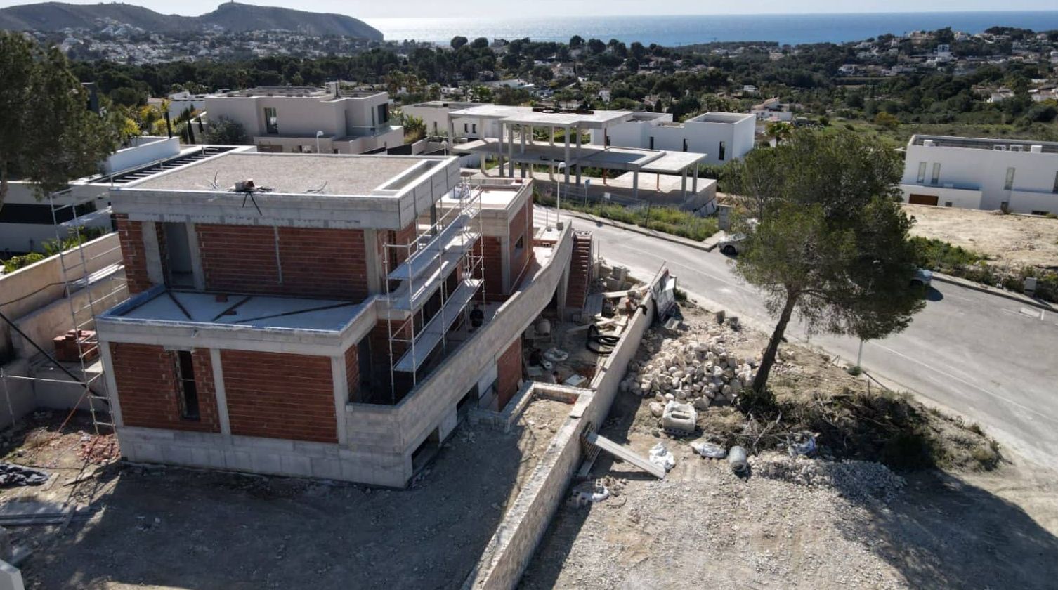Villa neuve avec vue sur la mer et piscine à débordement à Moraira